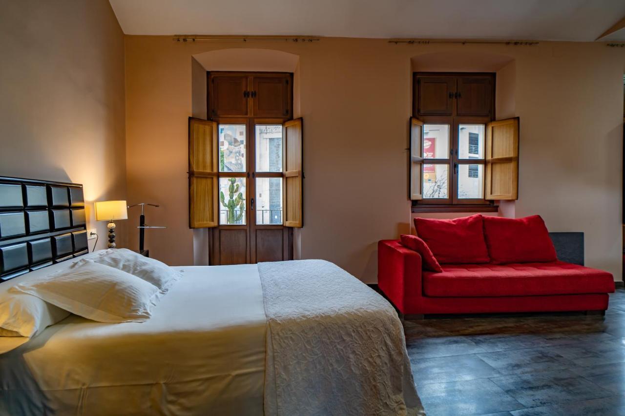 Hotel Alfonso IX (Adults Only) Caceres Bagian luar foto